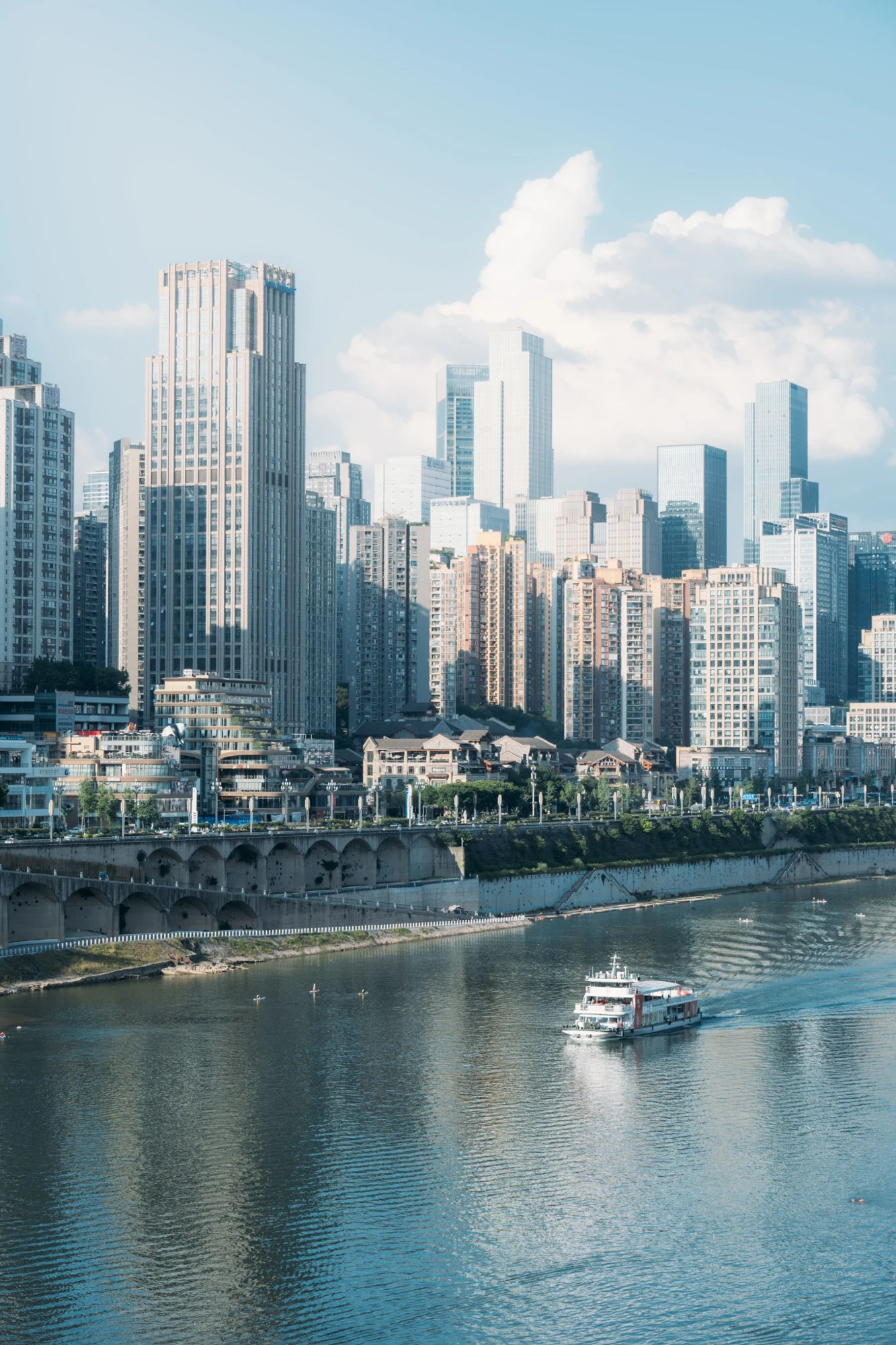 Riverside skyline with a sightseeing boat